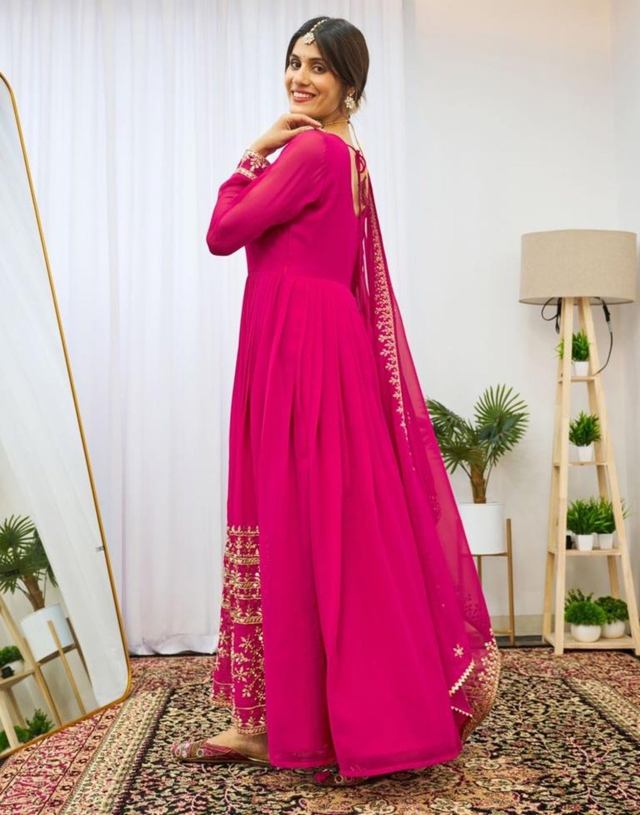 Pink Georgette with intricate zari and sequins work Gown