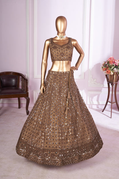 Keshavini Brown Soft Net Embroidered Lehenga Choli