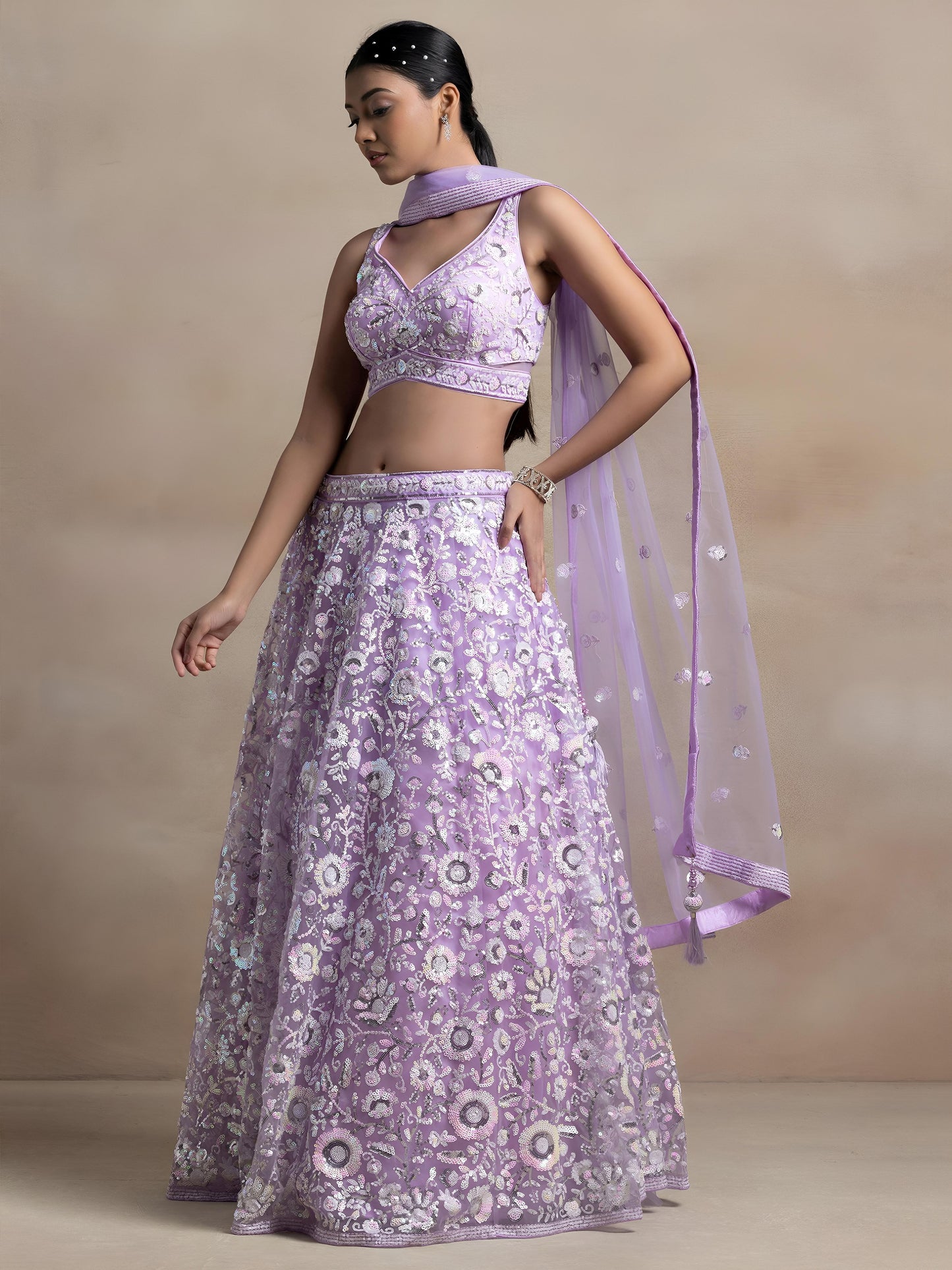 Mokshitha Lavender Soft Net Embroidered Lehenga Choli
