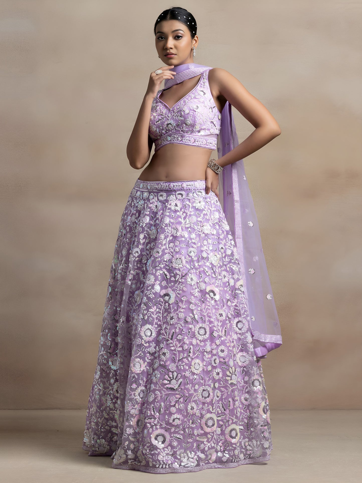 Mokshitha Lavender Soft Net Embroidered Lehenga Choli