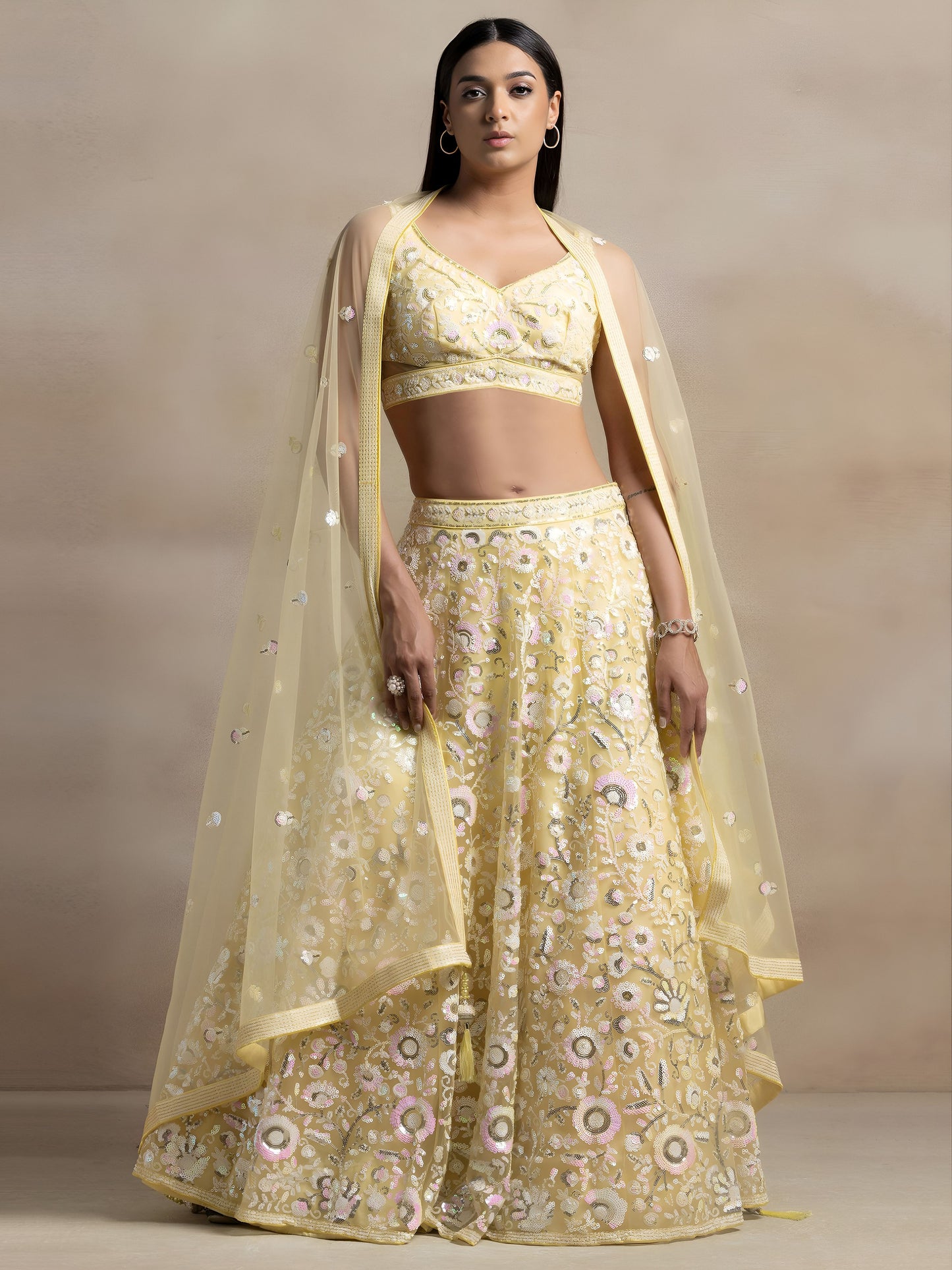 Kyraja Yellow Soft Net Embroidered Lehenga Choli