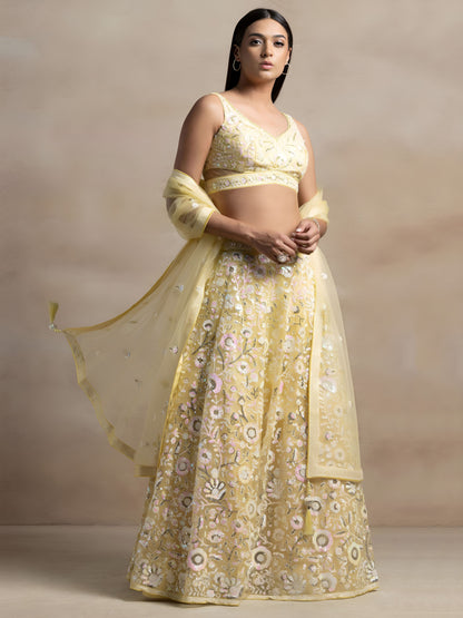 Kyraja Yellow Soft Net Embroidered Lehenga Choli