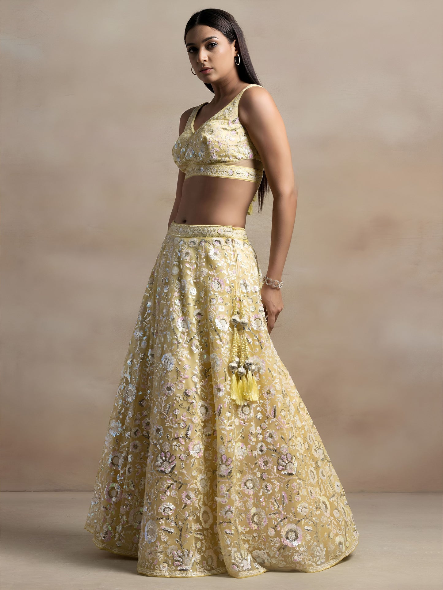Kyraja Yellow Soft Net Embroidered Lehenga Choli