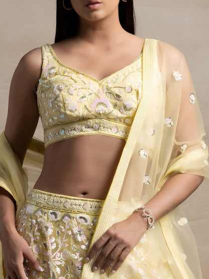Kyraja Yellow Soft Net Embroidered Lehenga Choli