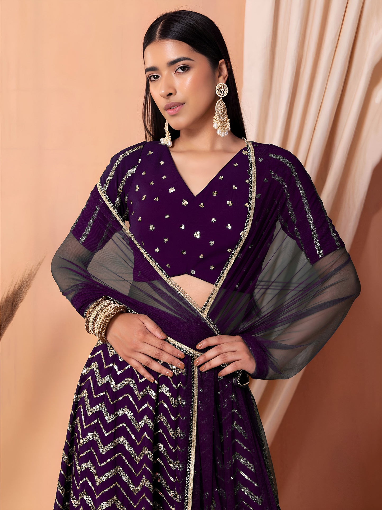 Nakshmira Purple Georgette Embroidered Lehenga Choli