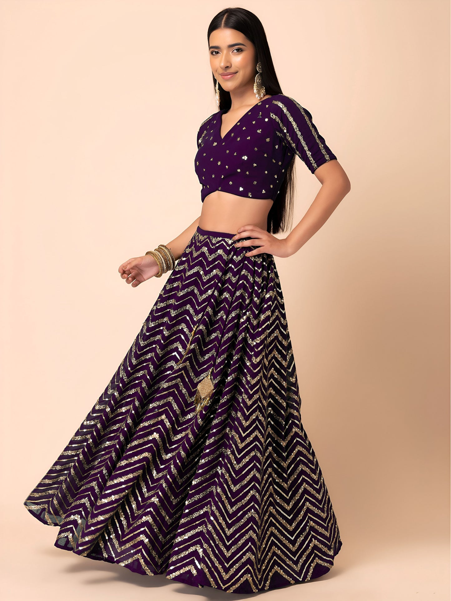 Nakshmira Purple Georgette Embroidered Lehenga Choli