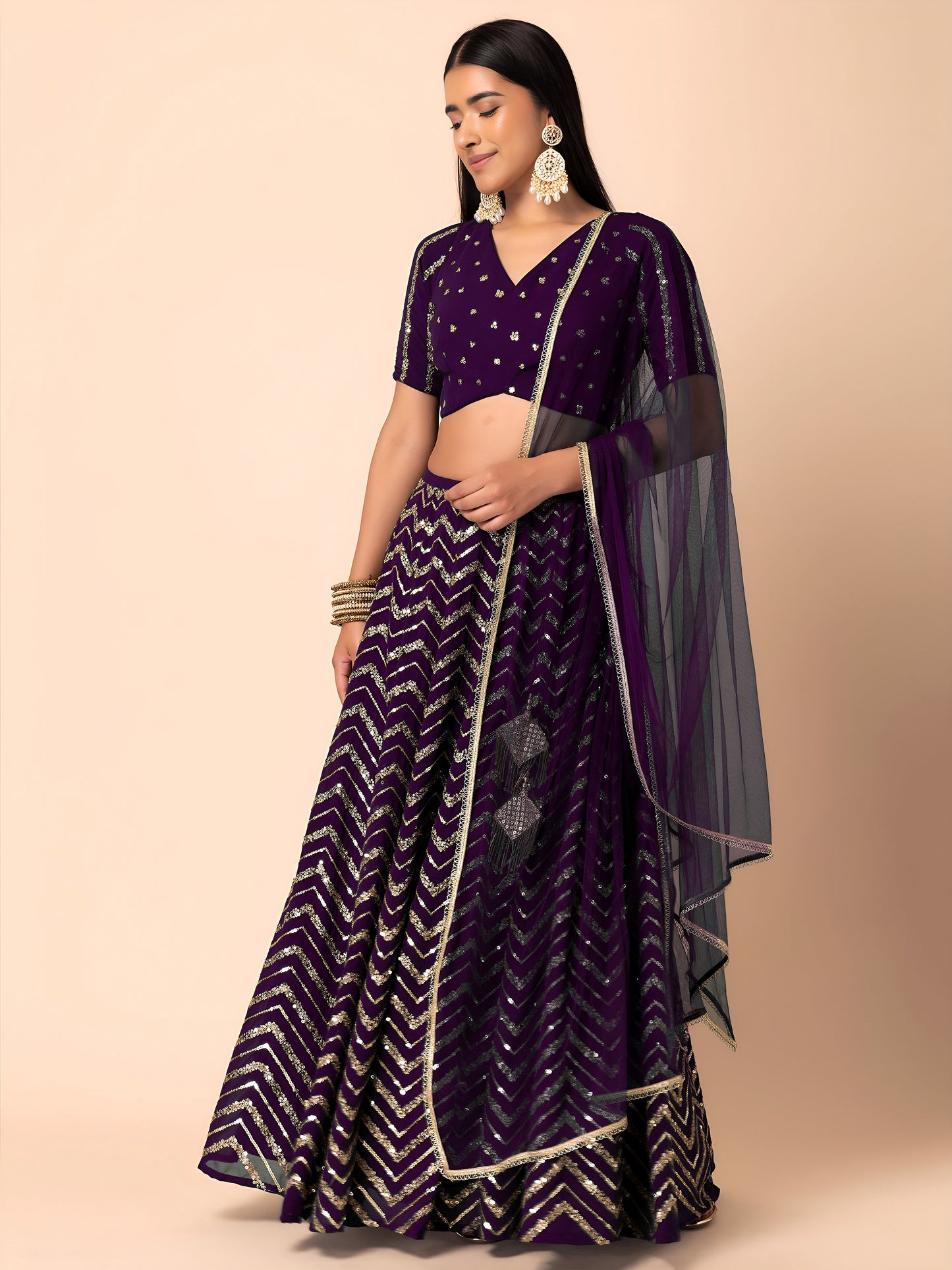 Nakshmira Purple Georgette Embroidered Lehenga Choli