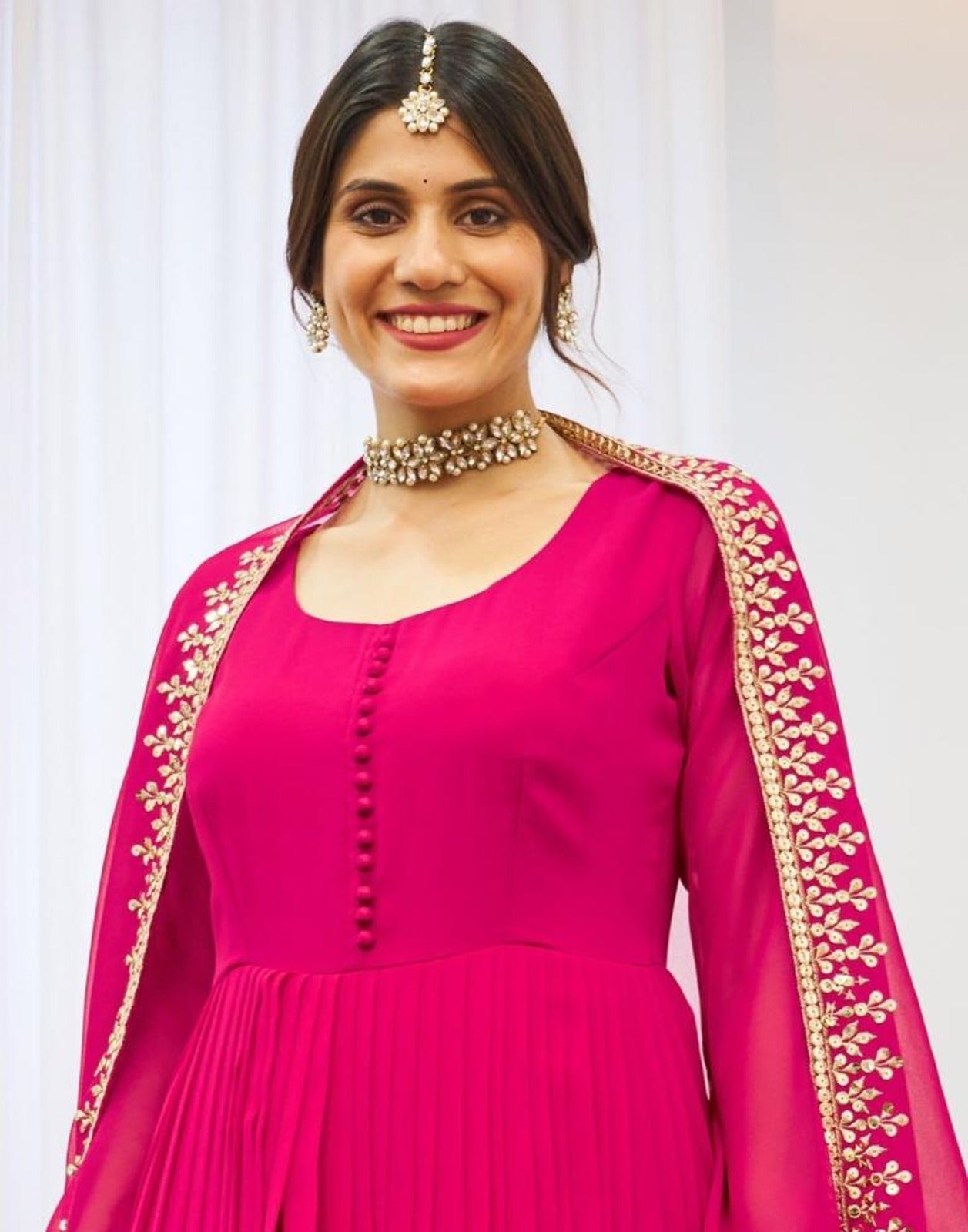 Pink Georgette with intricate zari and sequins work Gown