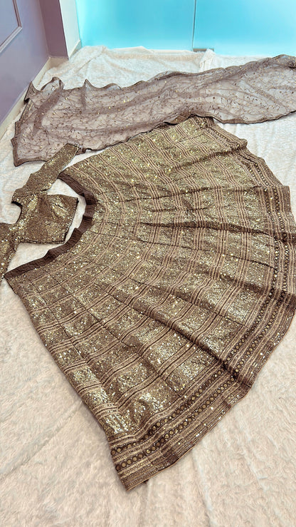 Aurumyra Golden Faux Georgette Lehenga Choli with Sequins, Zari & Dori Work