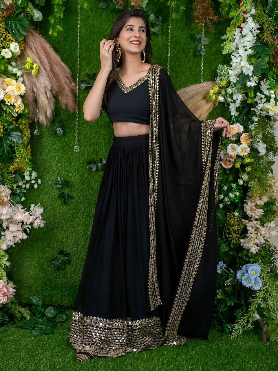Mrinalini Black Georgette Zari Sequins Embroidered Lehenga Choli