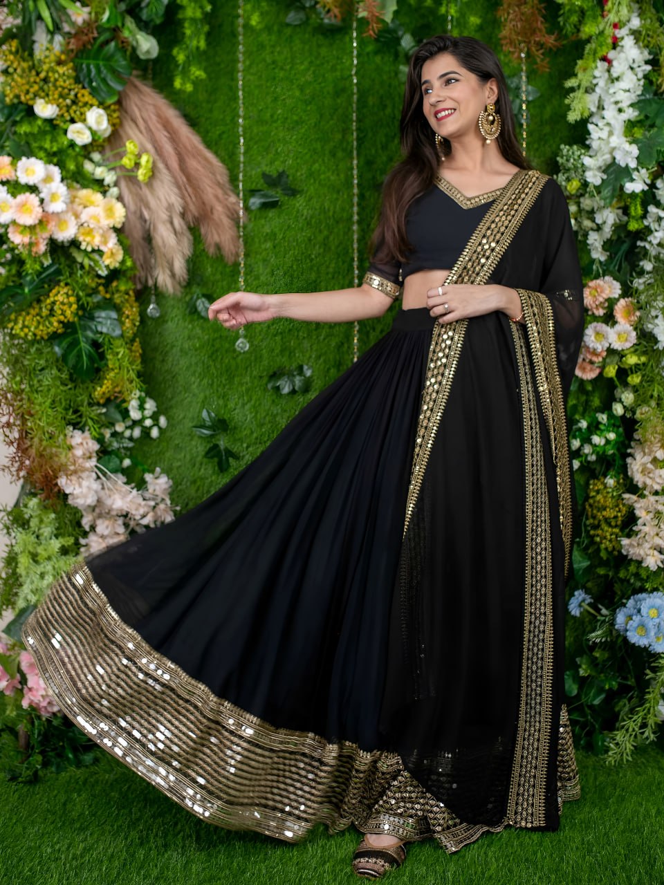 Mrinalini Black Georgette Zari Sequins Embroidered Lehenga Choli